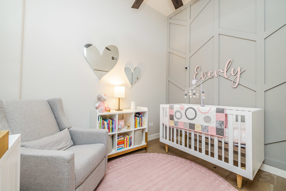 1301 West Madison Street, Unit 607 Chicago, IL 60607 - Photo 22 of 39 a bedroom with furniture and a book shelf