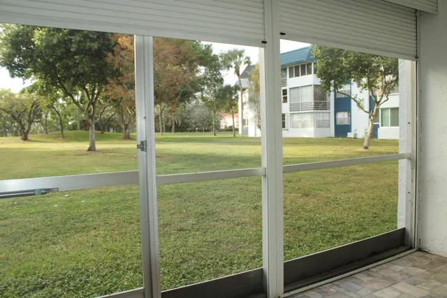 a view of a room with a large window
