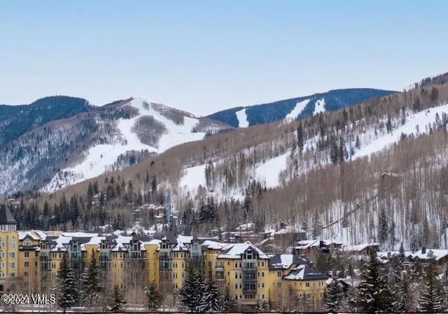 a view of a lake with mountain