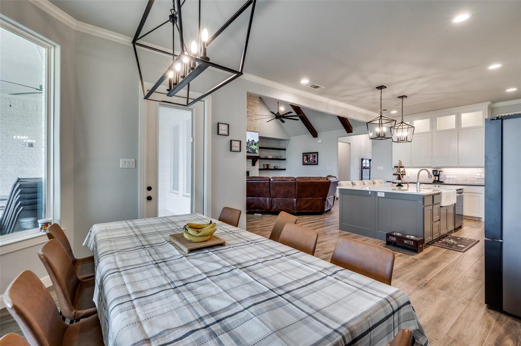 131 San Miguel Drive Decatur, TX 76234 - Photo 15 of 40 a living room with lots of furniture and kitchen view