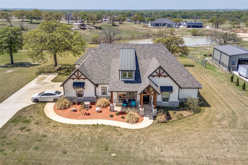 131 San Miguel Drive Decatur, TX 76234 - Photo 36 of 40 an aerial view of a house with a big yard