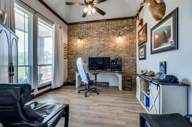 a workspace with furniture and a fireplace