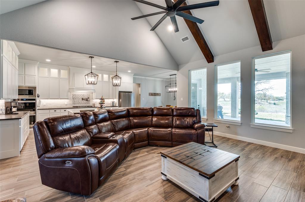 131 San Miguel Drive Decatur, TX 76234 - Photo 5 of 40 a living room with furniture and a window