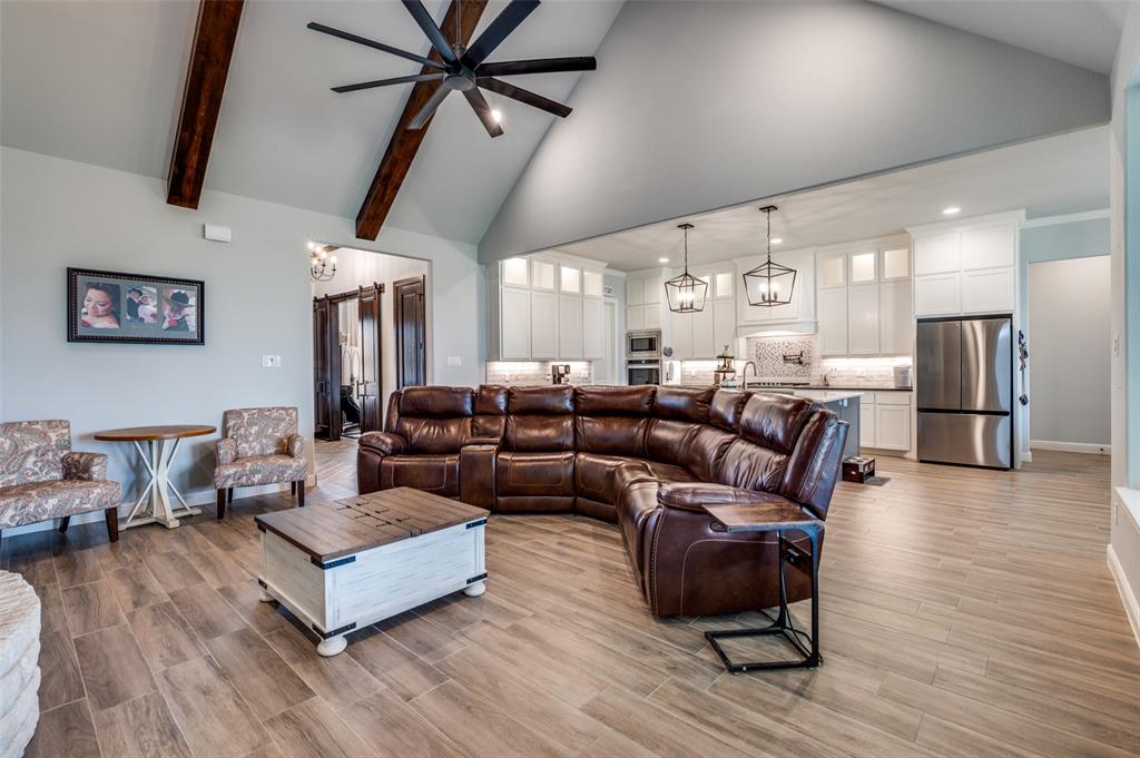 131 San Miguel Drive Decatur, TX 76234 - Photo 9 of 40 a living room with furniture and wooden floor