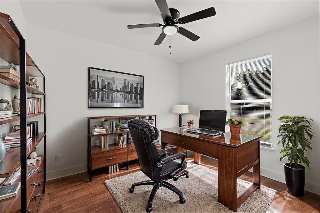 3901 Le May Avenue Dallas, TX 75216 - Photo 7 of 14 a view of a workspace with furniture and a window