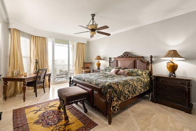 230 Ocean Grande Boulevard, Unit 802 Jupiter, FL 33477 - Photo 24 of 42 a bedroom with a bed and a chandelier