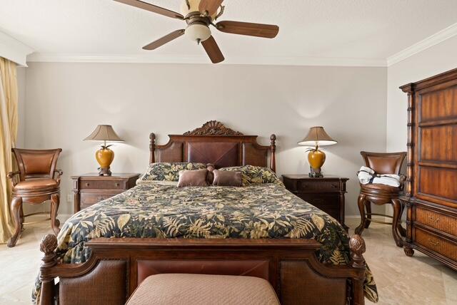 230 Ocean Grande Boulevard, Unit 802 Jupiter, FL 33477 - Photo 25 of 42 a bedroom with a bed and wooden floor