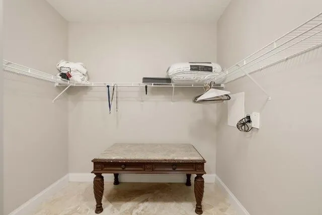 a bathroom with a large tub a shower and view