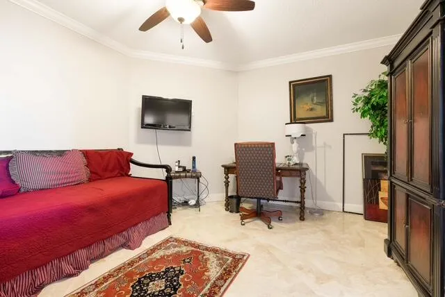 a dining room with furniture and front door
