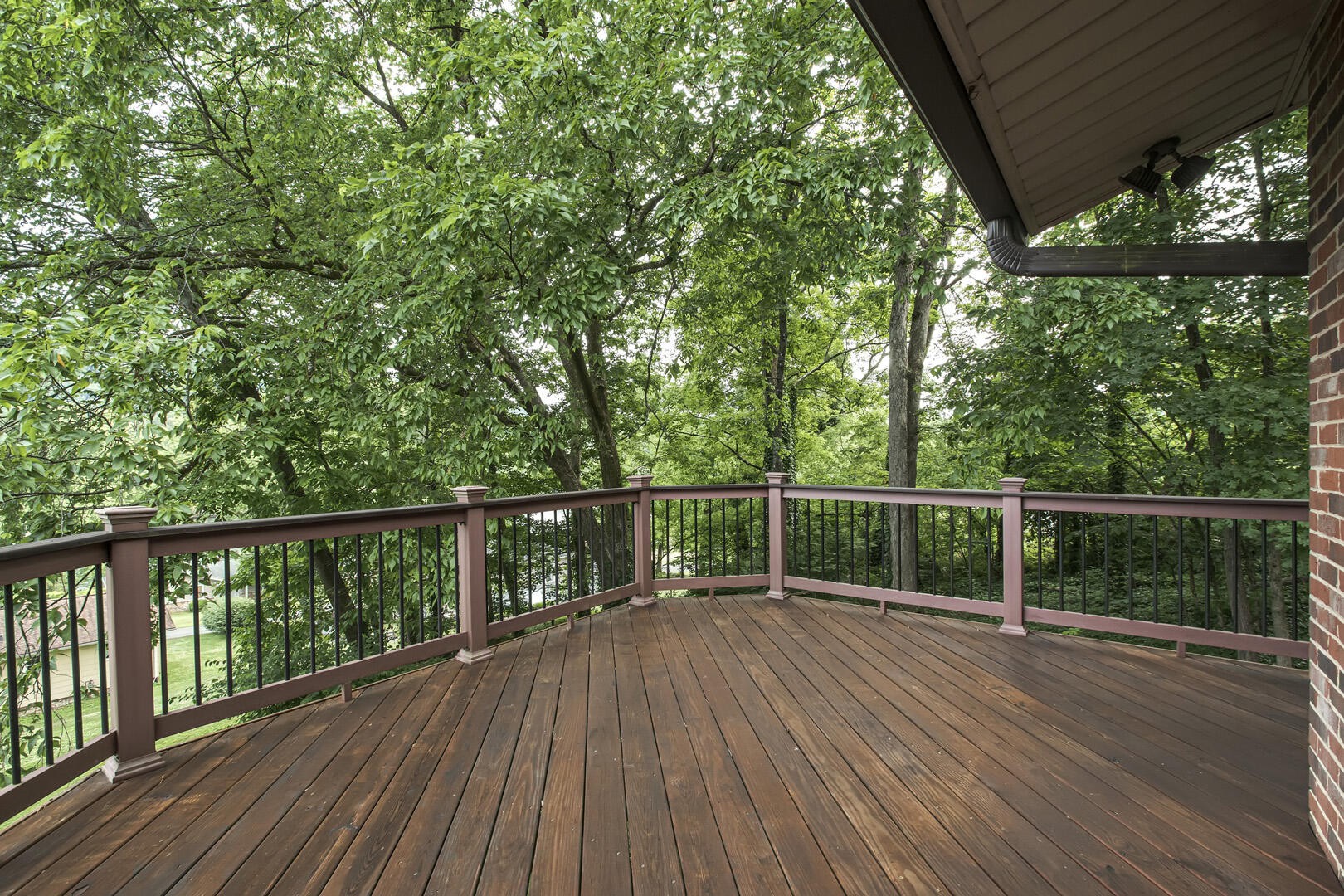 517 Gibbs Ferry Road Clinton, TN 37716 - Photo 11 of 36 a view of balcony with wooden floor and fence