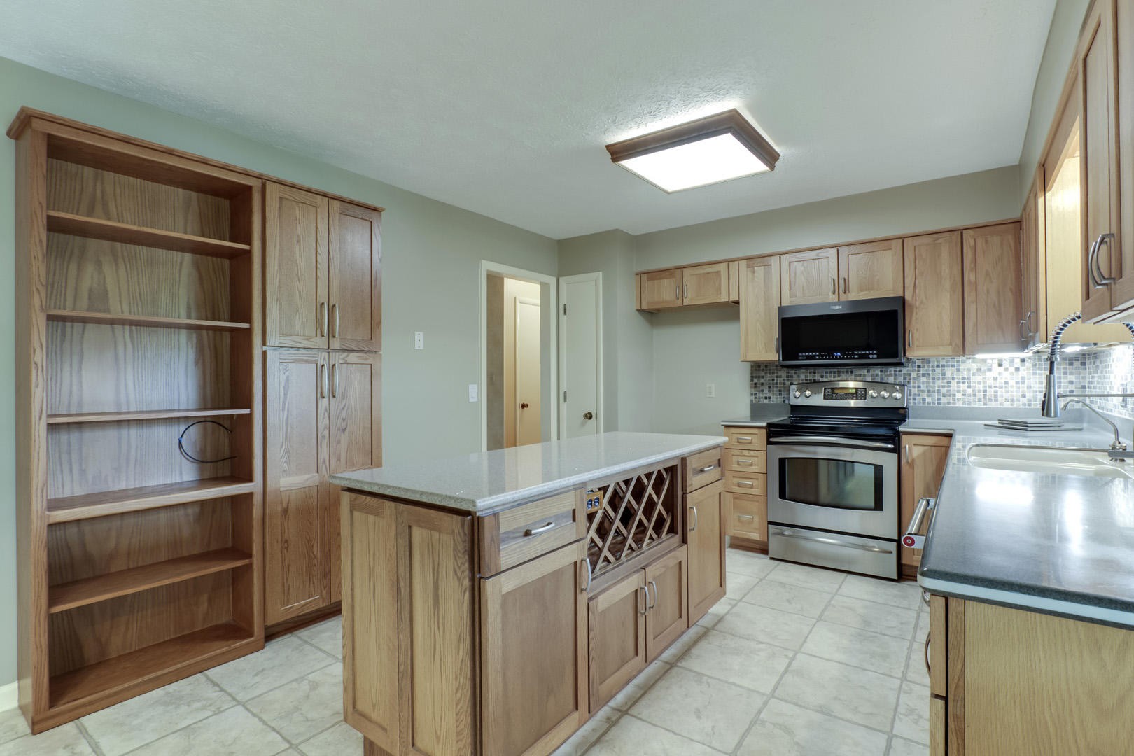 517 Gibbs Ferry Road Clinton, TN 37716 - Photo 8 of 36 a kitchen with stainless steel appliances a stove and a refrigerator