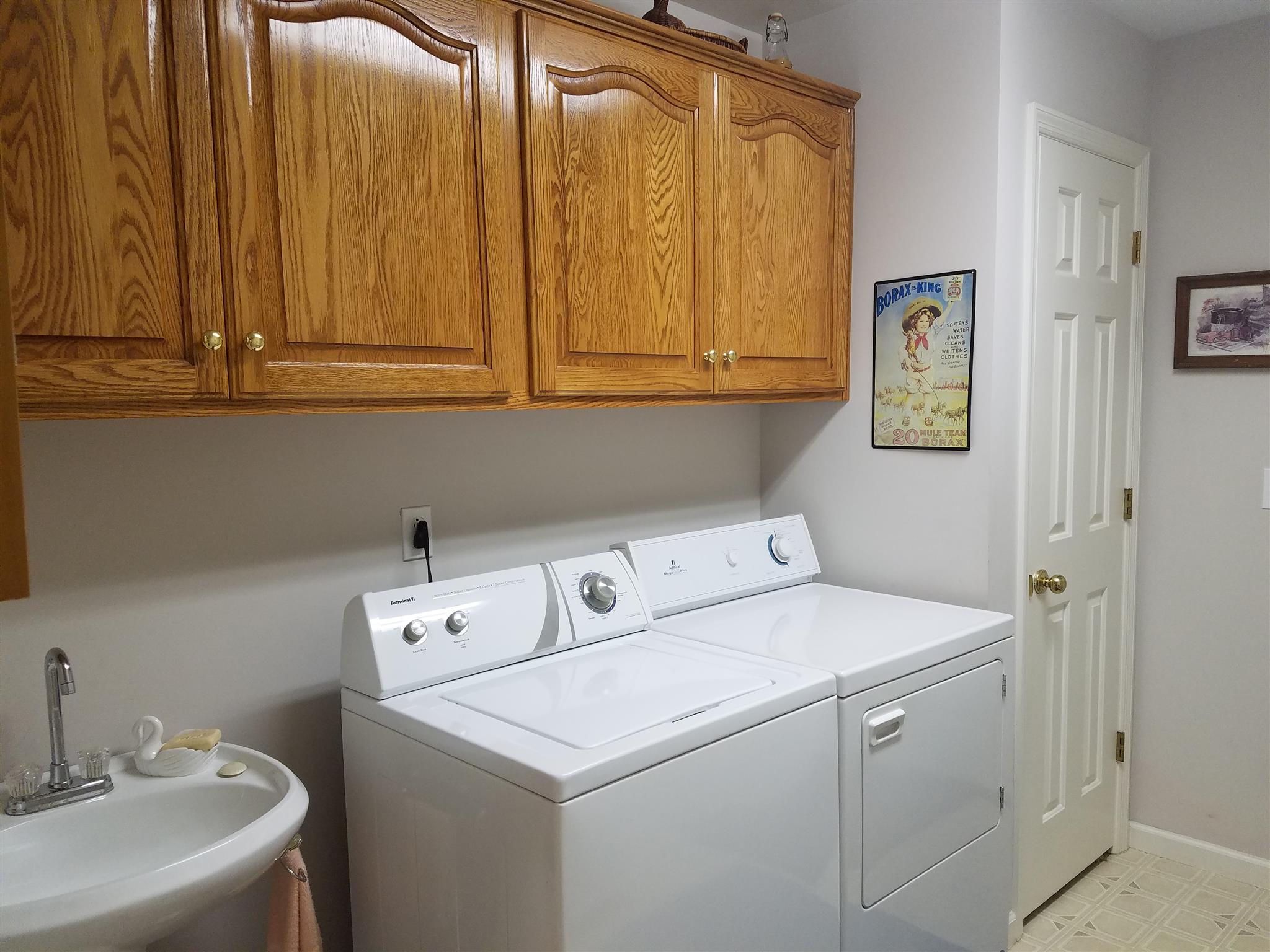 346 Petty Road Manchester, TN 37355 - Photo 16 of 30 Time for Laundry....Sink, Storage Cabinets, Closet, and a Washer & Dryer that Stay with the Home!