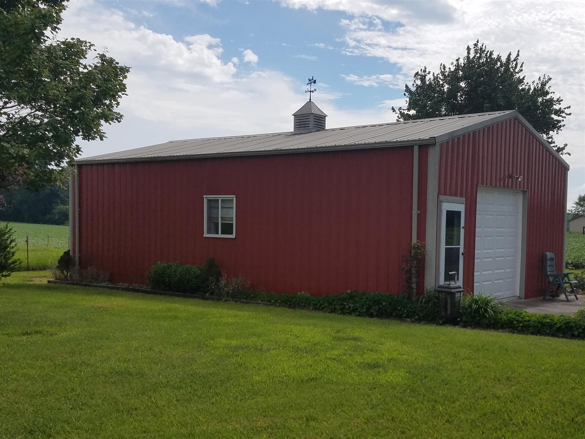 346 Petty Road Manchester, TN 37355 - Photo 25 of 30 Well Maintained with Work Bench, Shelving, and Electricity. This Could be Your Home Business.