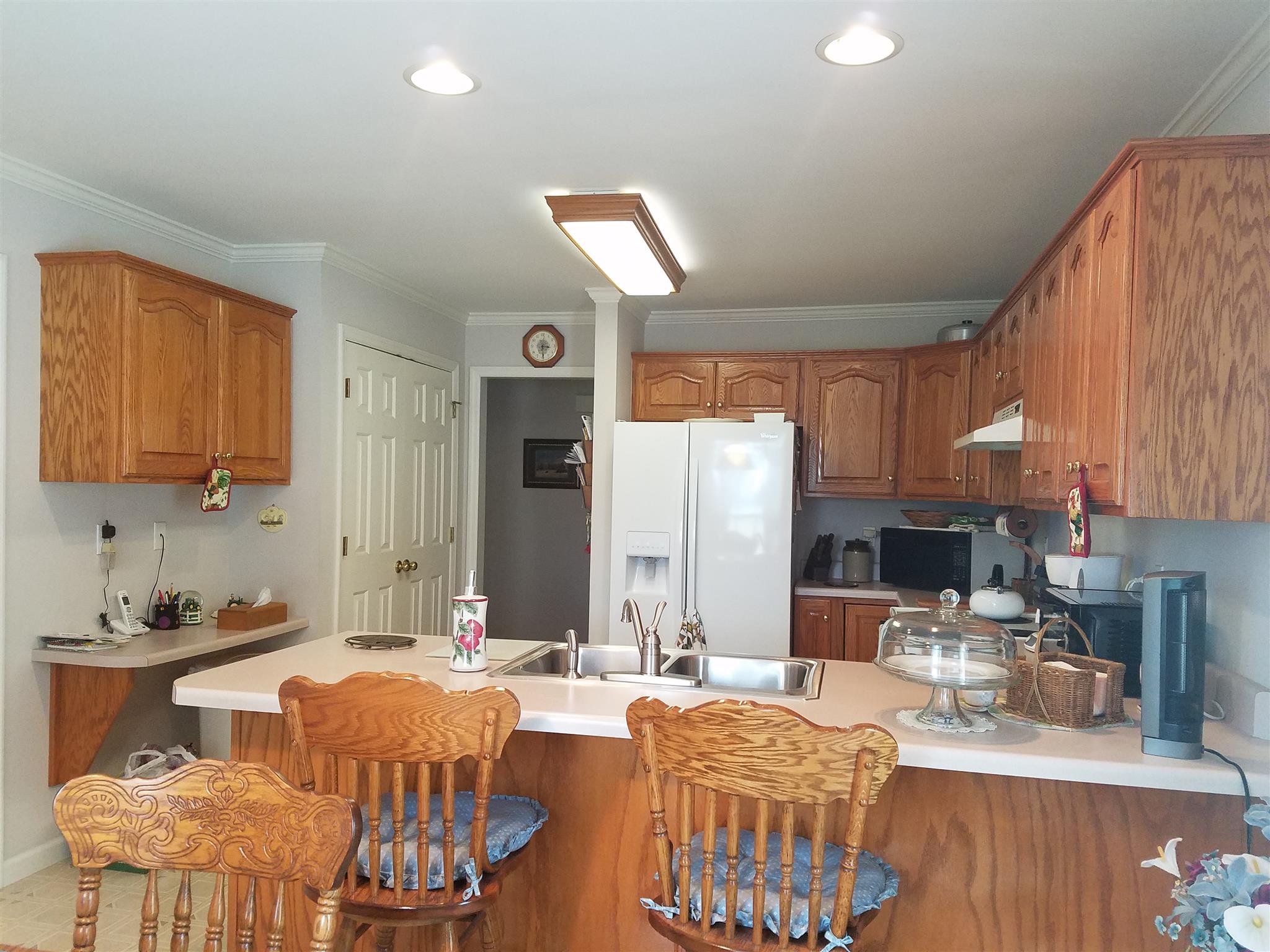 346 Petty Road Manchester, TN 37355 - Photo 6 of 30 Timeless Oak Cabinetry and Expansive Counter Space Make This Kitchen Easy to Work In and a Gathering Place.