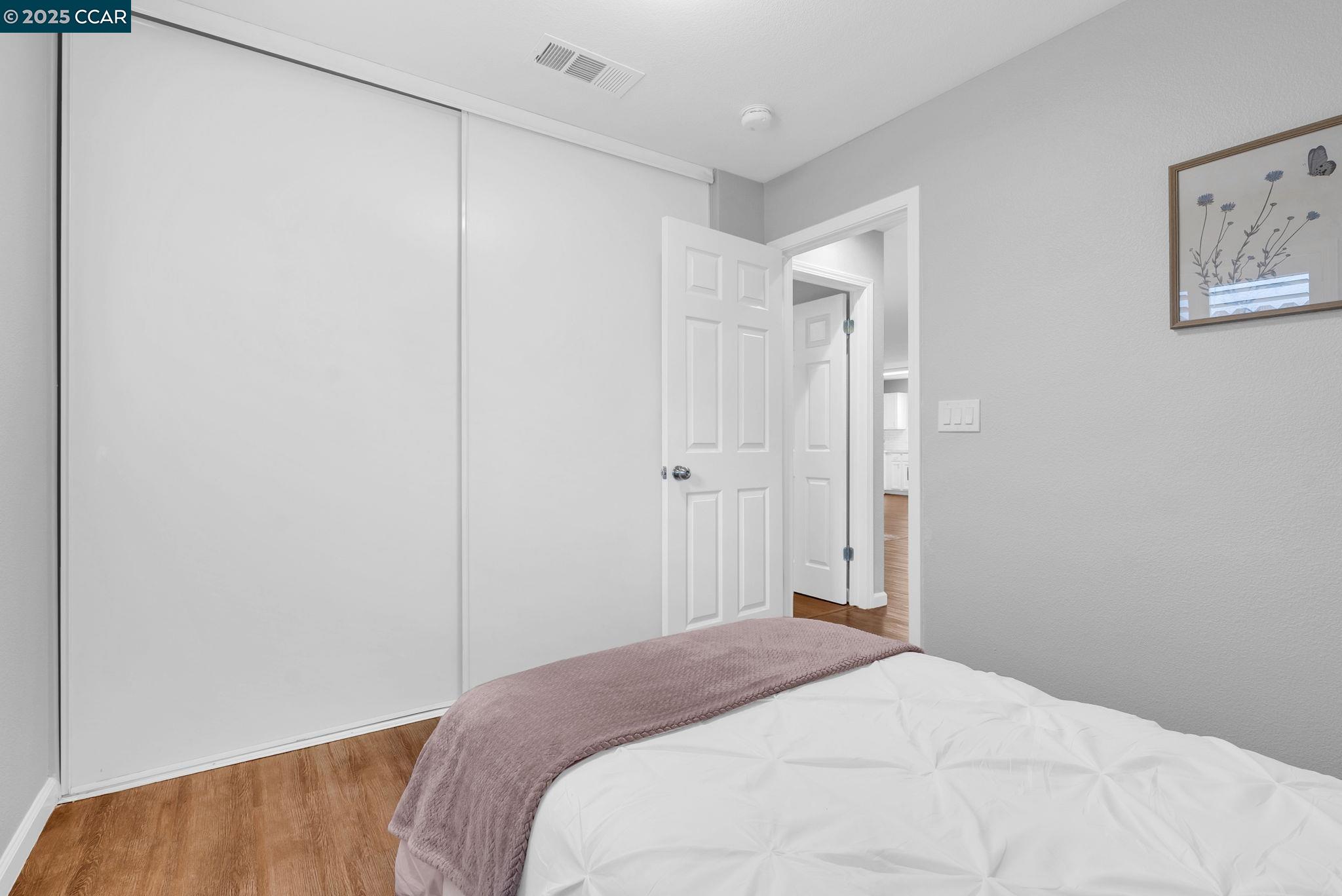 432 Red Robin Drive Patterson, CA 95363 - Photo 27 of 47 a bedroom with a bed and a shower