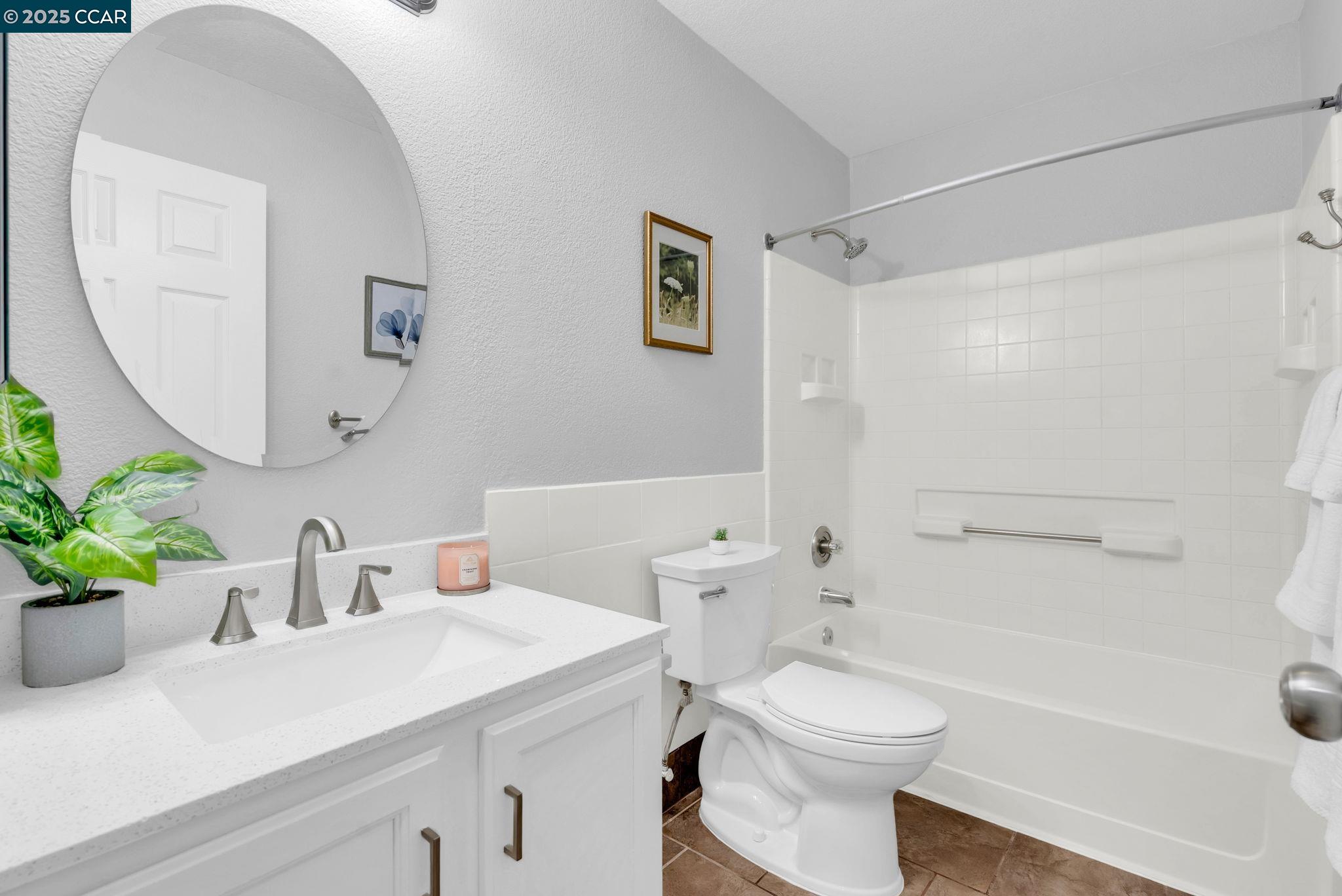 432 Red Robin Drive Patterson, CA 95363 - Photo 29 of 47 a bathroom with a sink a toilet and shower