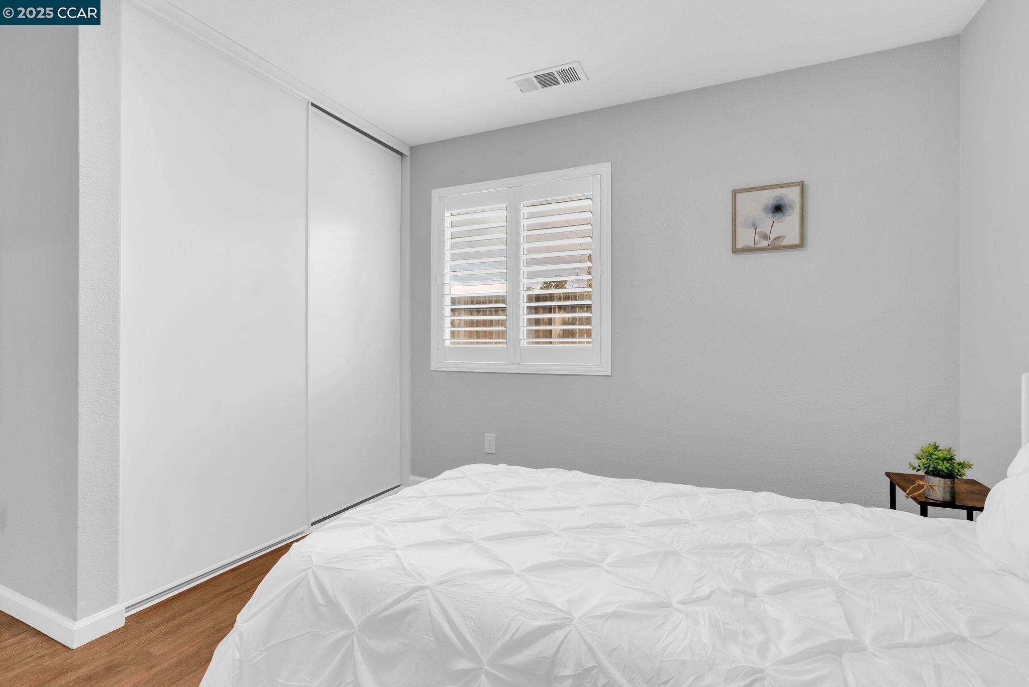 432 Red Robin Drive Patterson, CA 95363 - Photo 31 of 47 a bedroom with a bed and a window