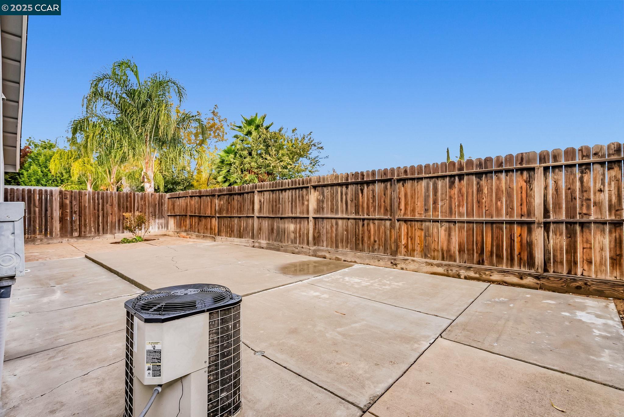 432 Red Robin Drive Patterson, CA 95363 - Photo 42 of 47 a view of terrace with wooden fence