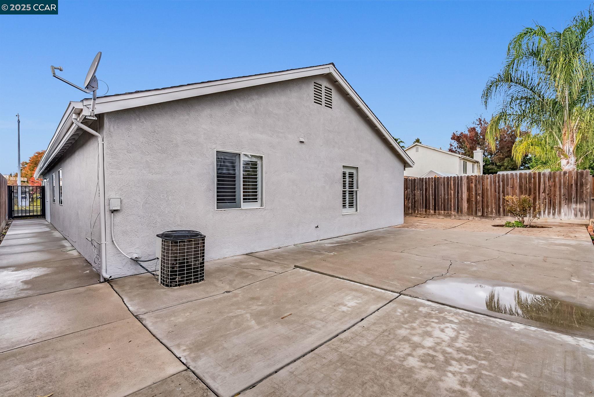 432 Red Robin Drive Patterson, CA 95363 - Photo 45 of 47 a front view of a house with a yard