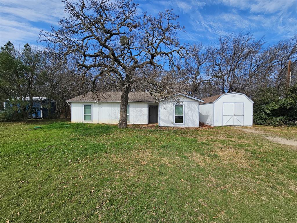 110 Muleta Drive Oak Point, TX 75068 - Photo 1 of 1 a house view with a garden