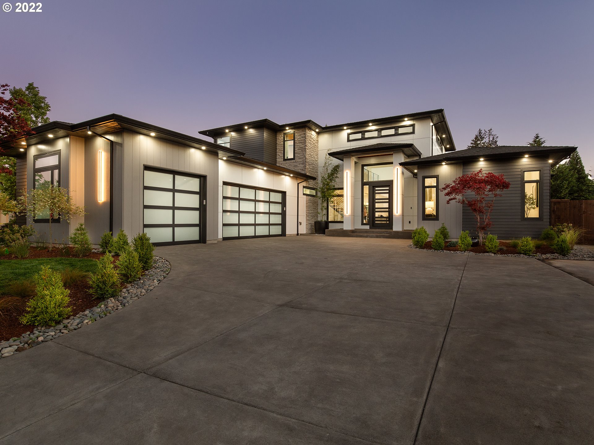 2201 South 19th Way Ridgefield, WA 98642 - Photo 1 of 32 a front view of a house with a yard and garage