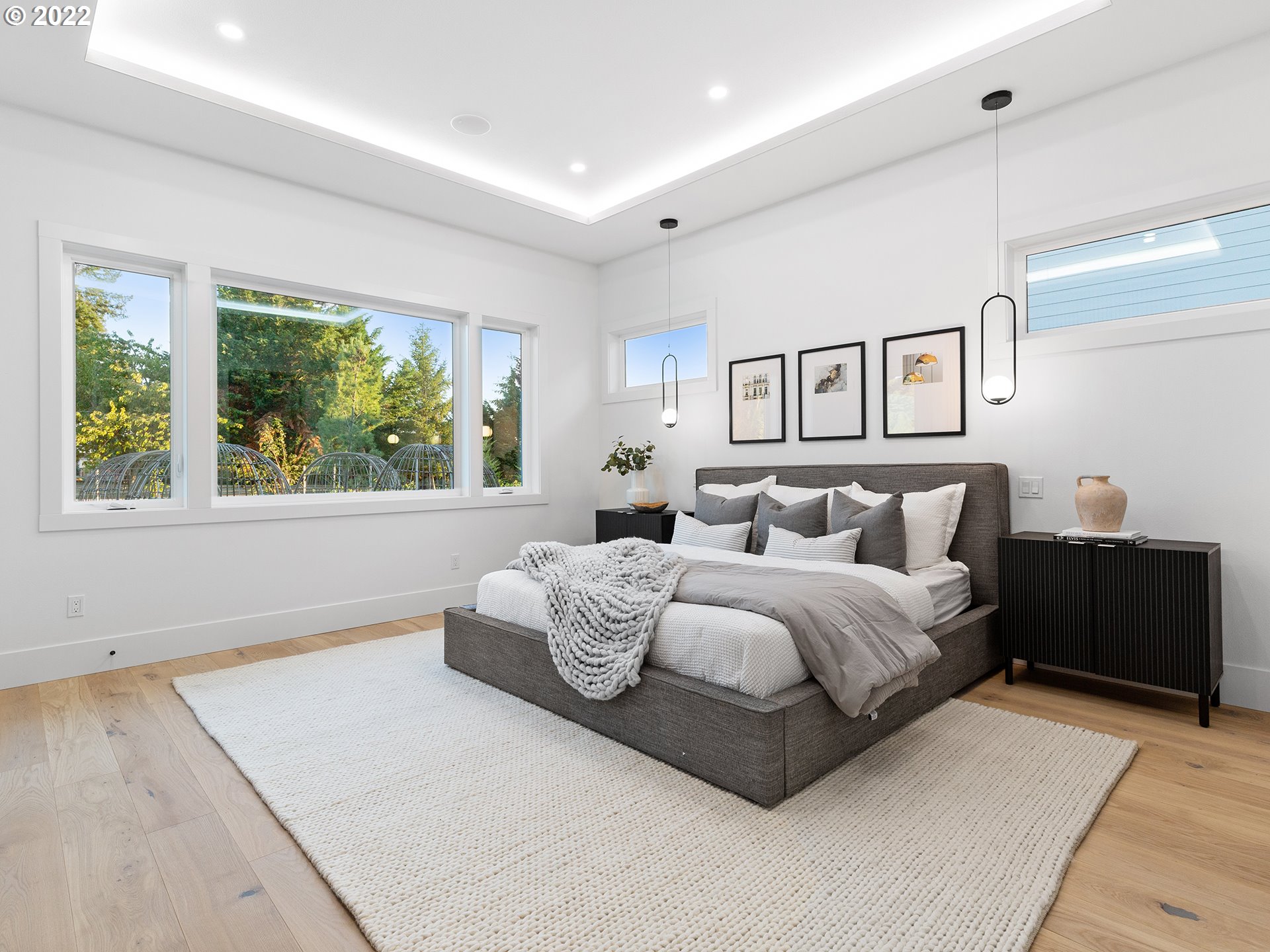 2201 South 19th Way Ridgefield, WA 98642 - Photo 11 of 32 a spacious bedroom with a large bed and a window