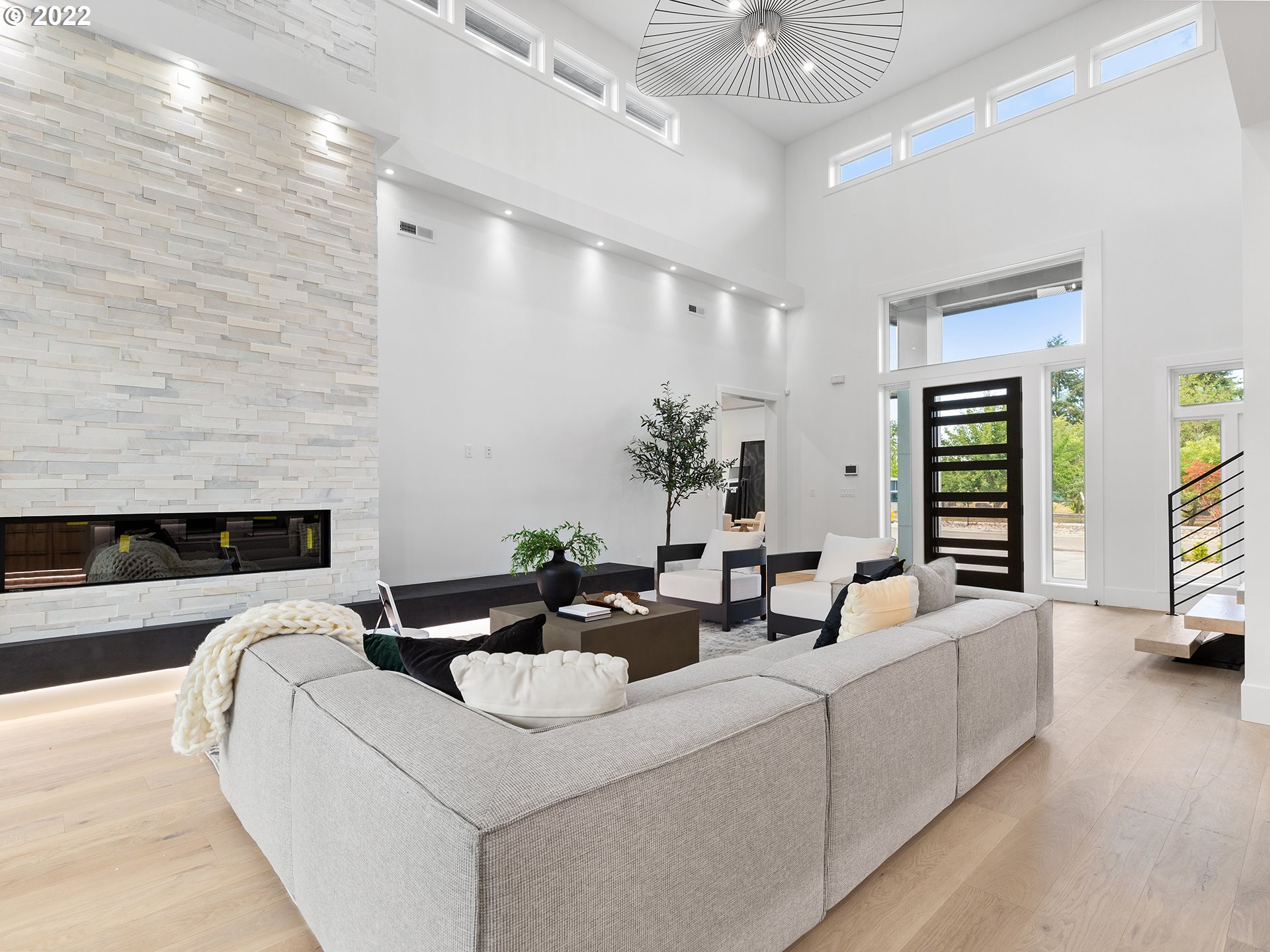 2201 South 19th Way Ridgefield, WA 98642 - Photo 5 of 32 a living room with furniture and a fireplace