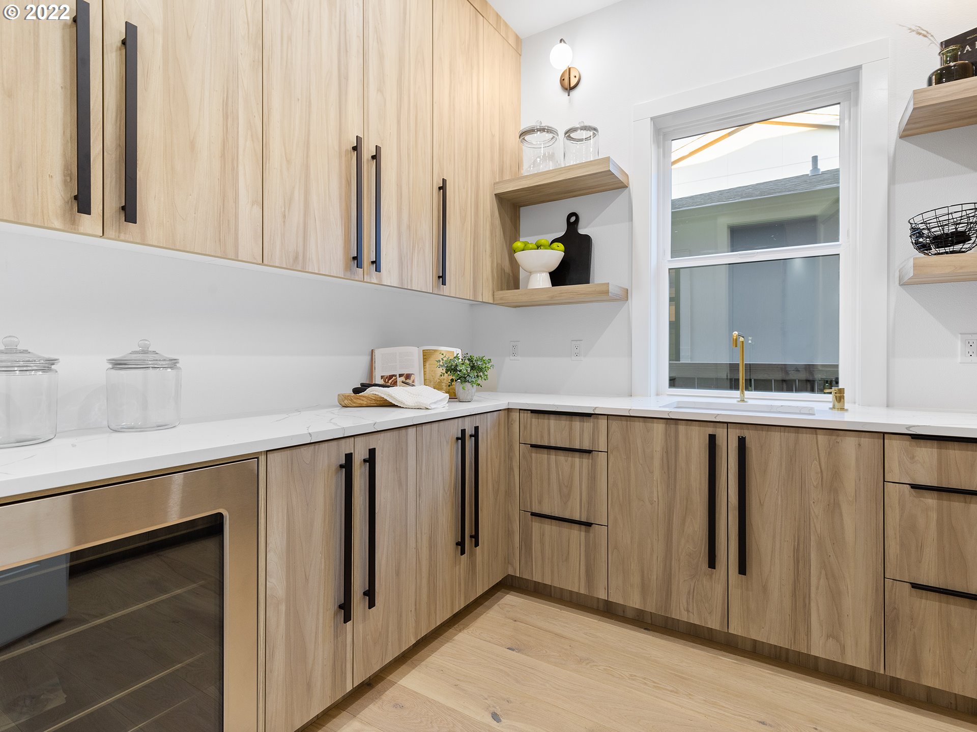 2201 South 19th Way Ridgefield, WA 98642 - Photo 10 of 32 a kitchen with stainless steel appliances a sink and cabinets