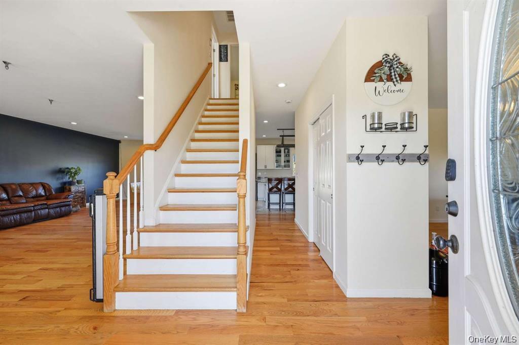 133 Old Chester Road Goshen, NY 10924 - Photo 14 of 33 a view of a hallway with wooden floor and entryway