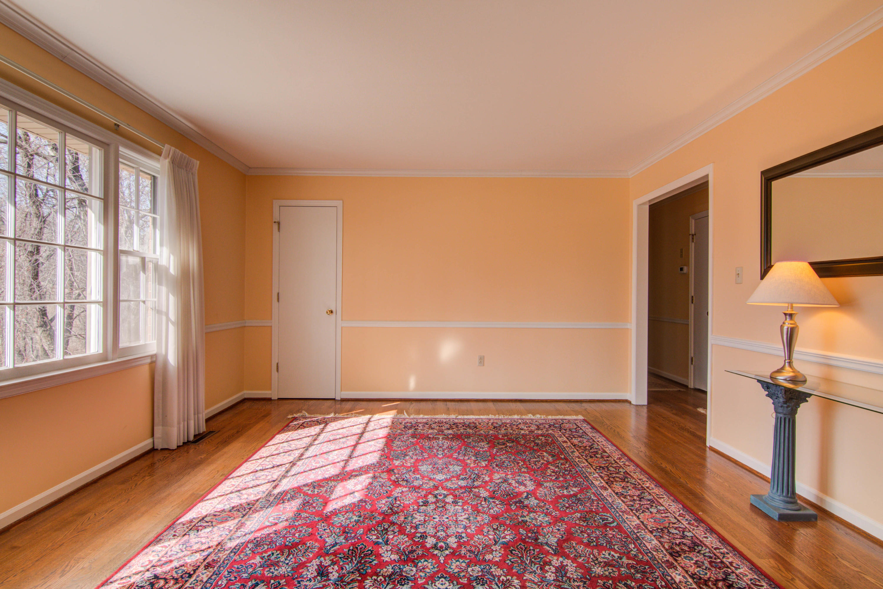 4606 Rosecrest Road Roanoke, VA 24018 - Photo 14 of 28 an empty room with wooden floor and windows