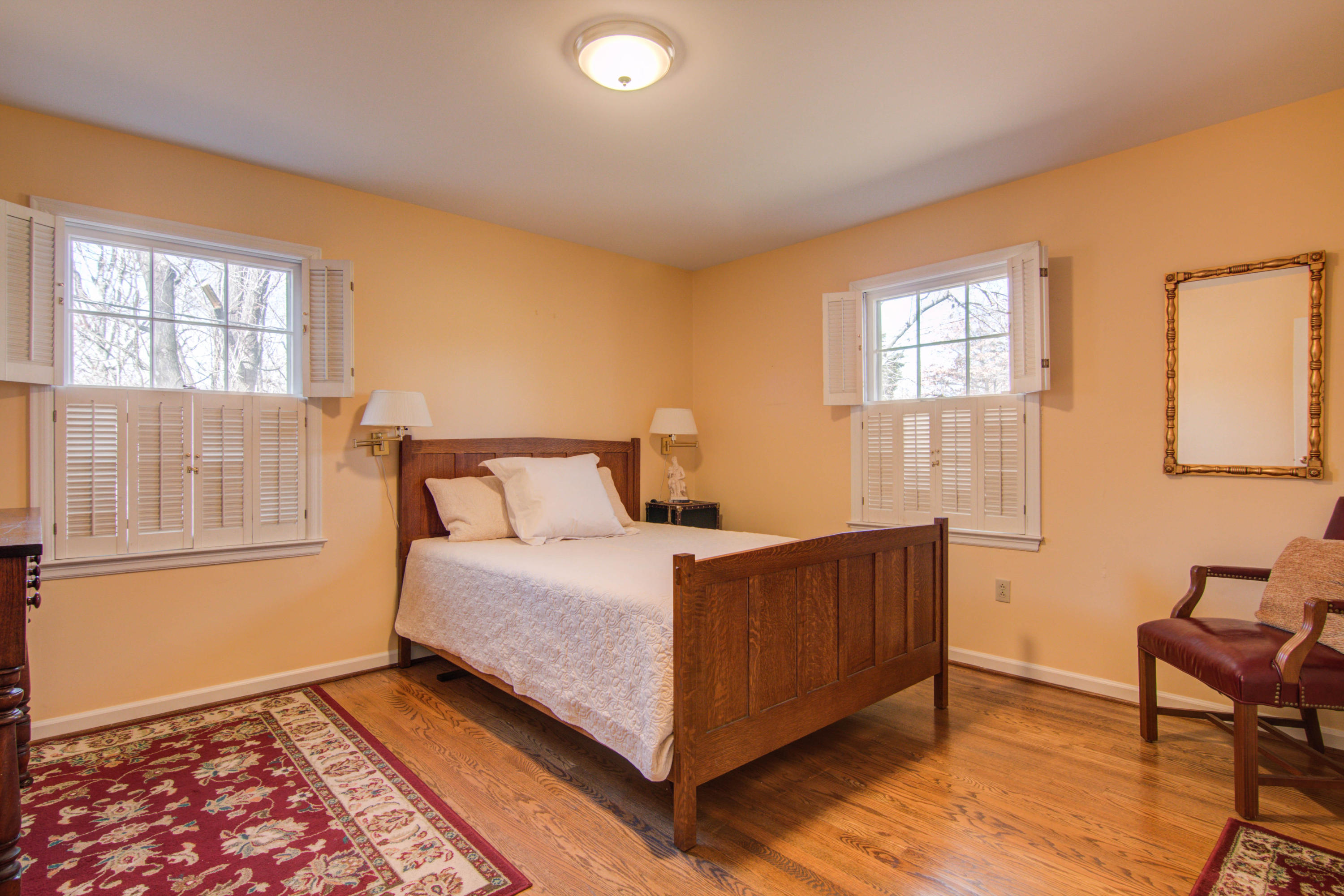4606 Rosecrest Road Roanoke, VA 24018 - Photo 9 of 28 a bedroom with a bed lamp and a window