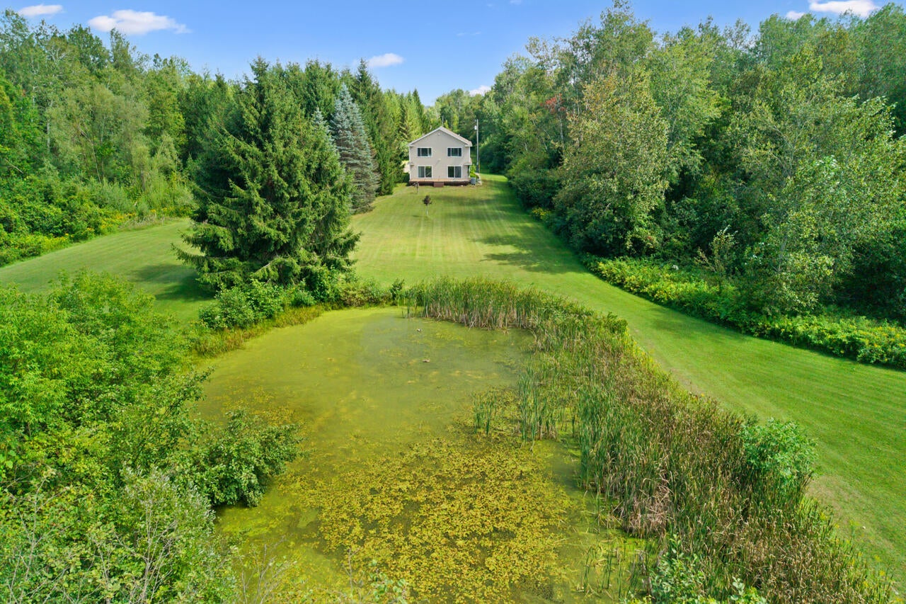 1320 Joseph Road Alpena, MI 49707 - Photo 13 of 42 pond towards home