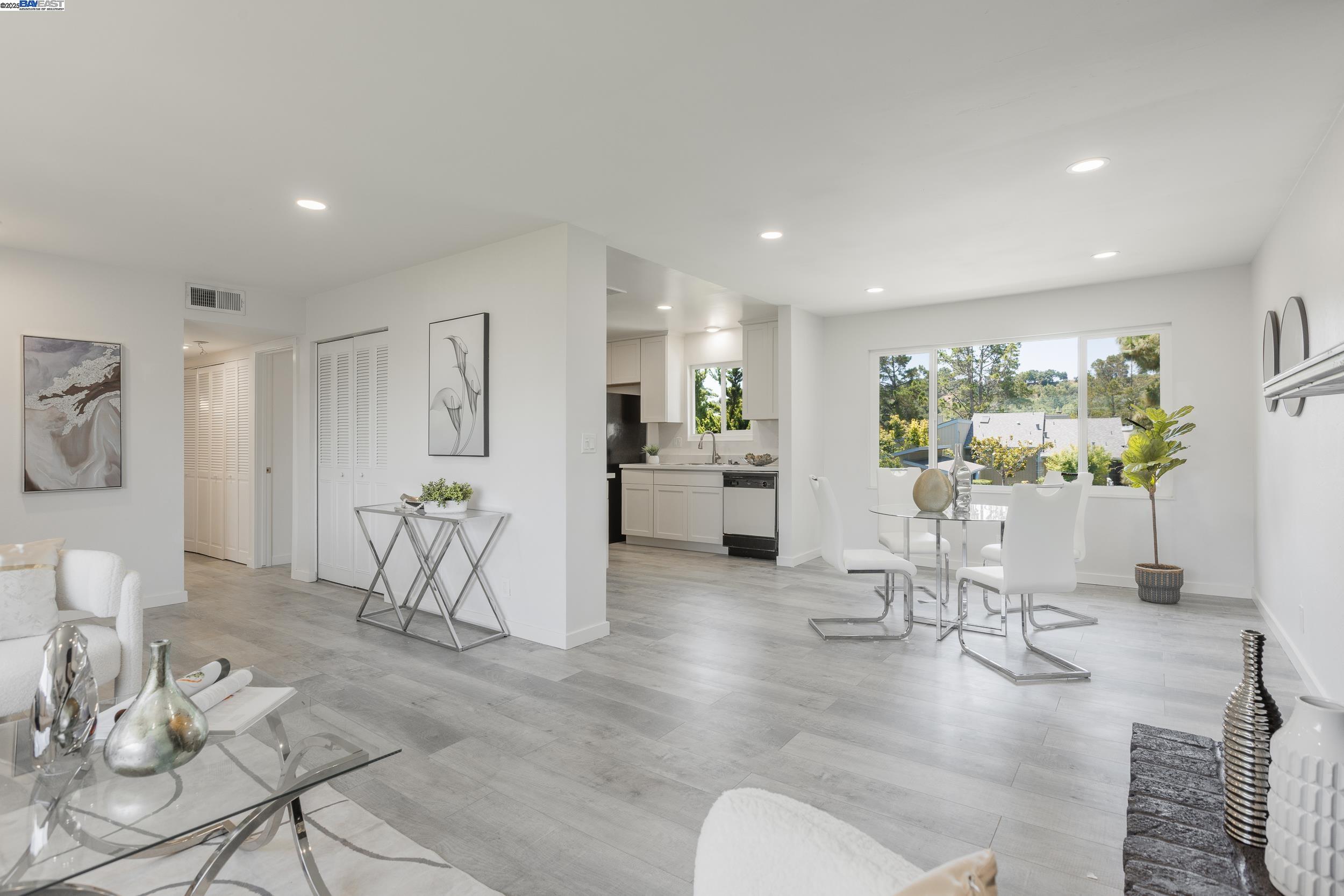 1965 Ascot Drive, Unit 6 Moraga, CA 94556 - Photo 1 of 25 a living room with furniture and a table