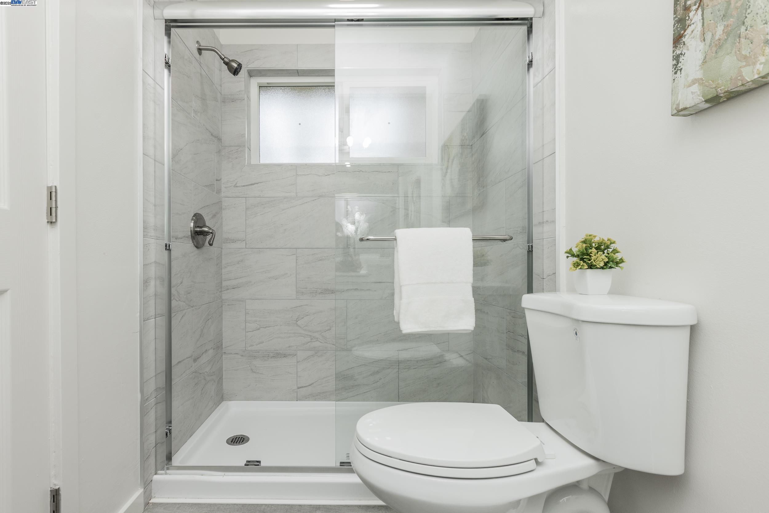 1965 Ascot Drive, Unit 6 Moraga, CA 94556 - Photo 11 of 25 a white toilet sitting next to a bathtub