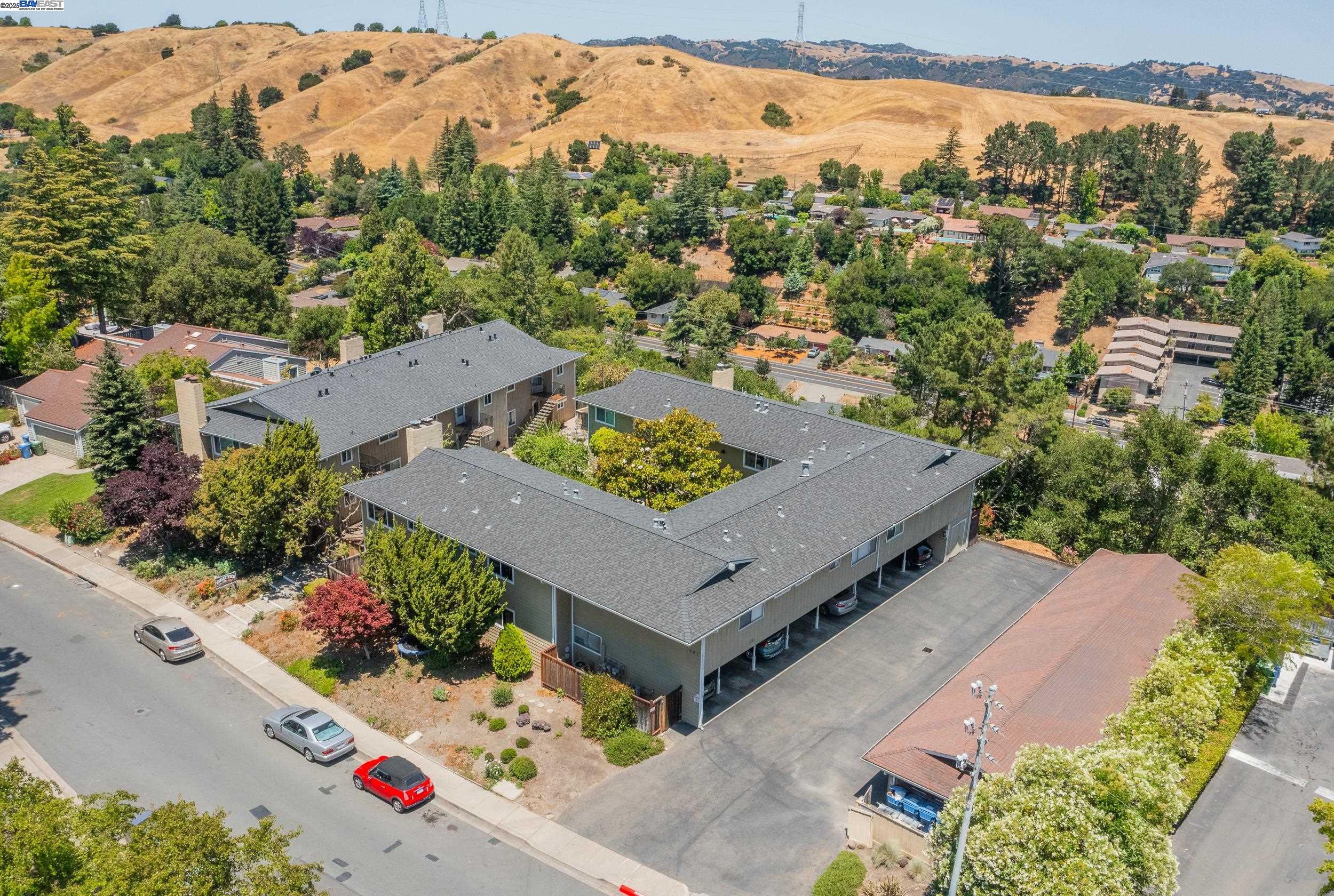 1965 Ascot Drive, Unit 6 Moraga, CA 94556 - Photo 23 of 25 an aerial view of a house with a garden