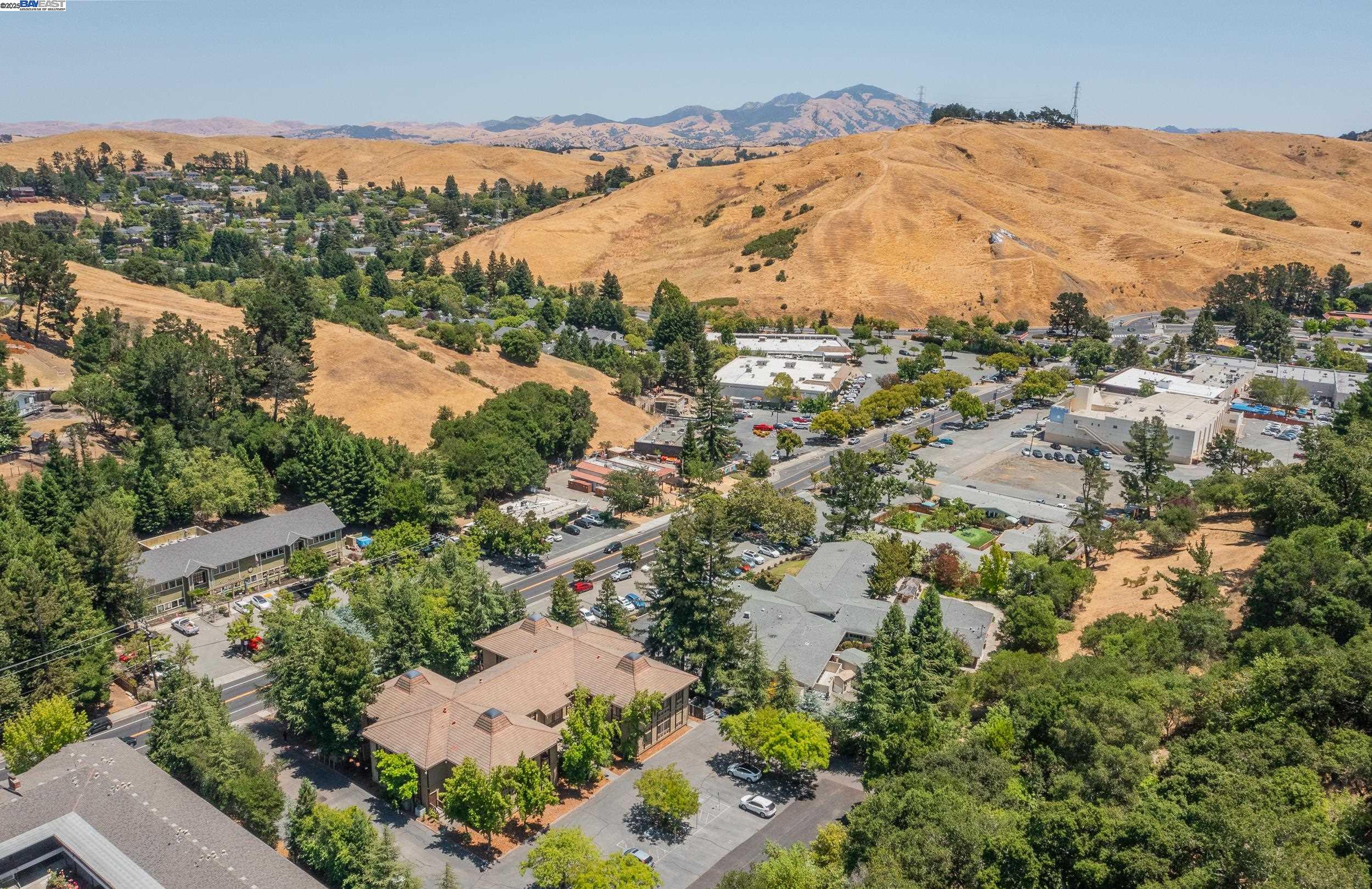1965 Ascot Drive, Unit 6 Moraga, CA 94556 - Photo 25 of 25 an aerial view of mountain with residential house and mountains in the background
