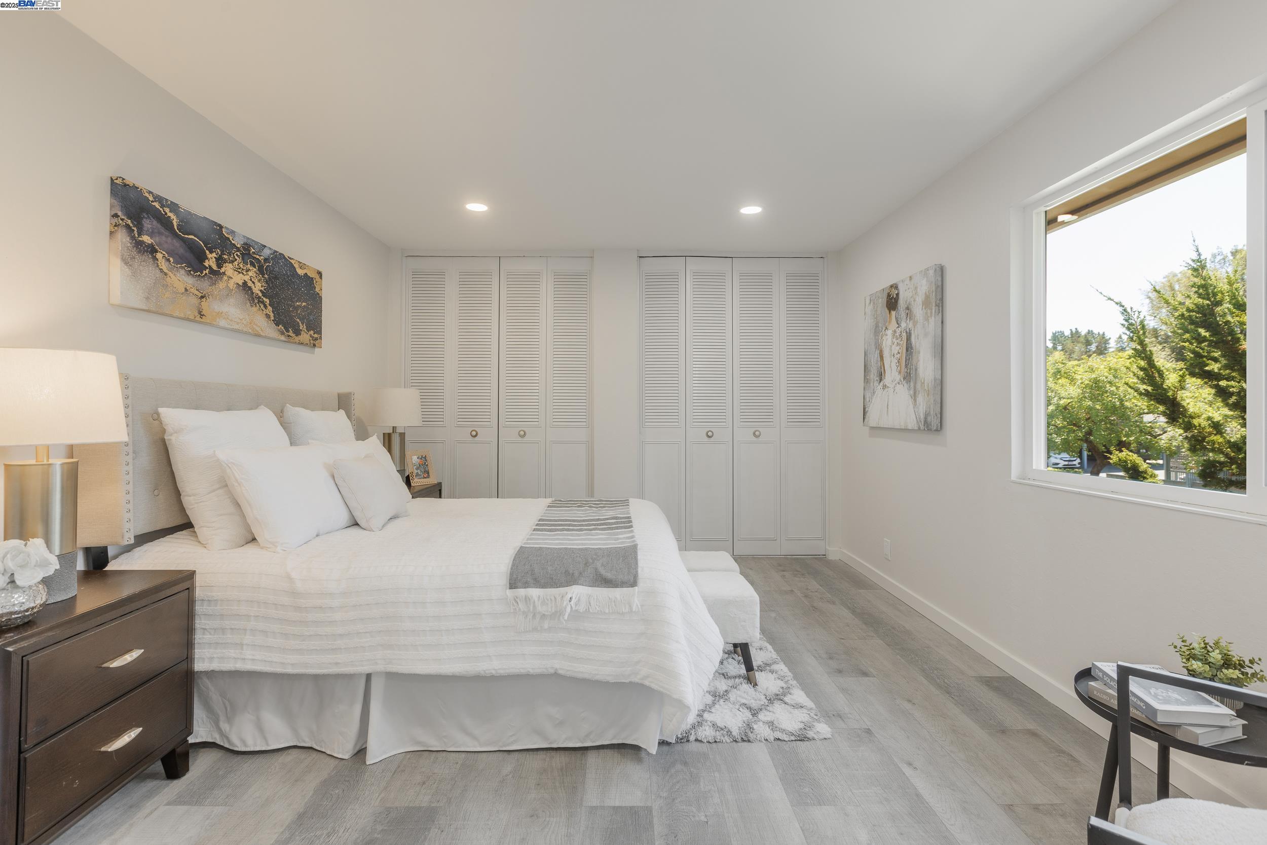 1965 Ascot Drive, Unit 6 Moraga, CA 94556 - Photo 8 of 25 a large white bed in a white room