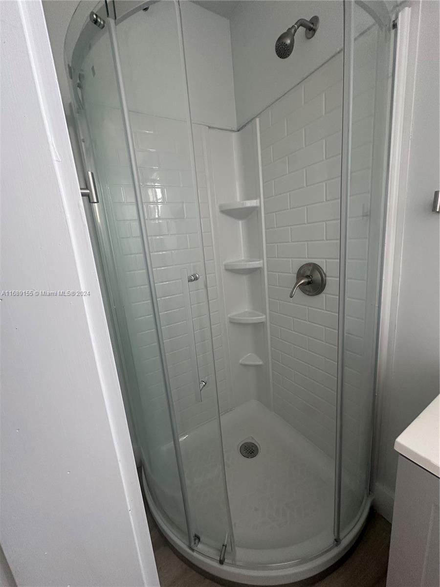 Miami-Dade County Miami, FL 33173 - Photo 6 of 11 a bathroom with a shower and toilet