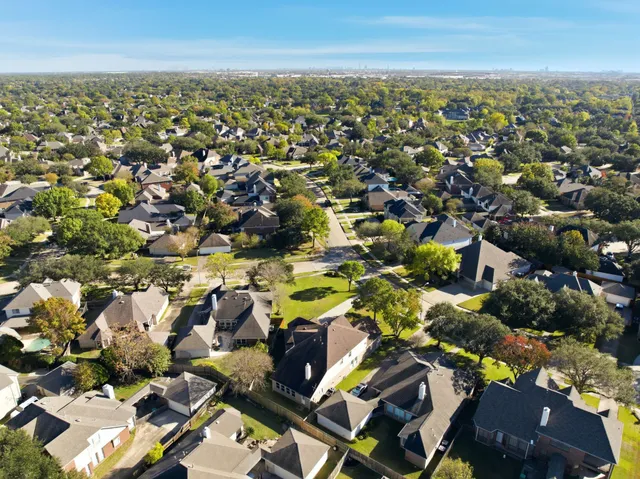 an aerial view of multiple house