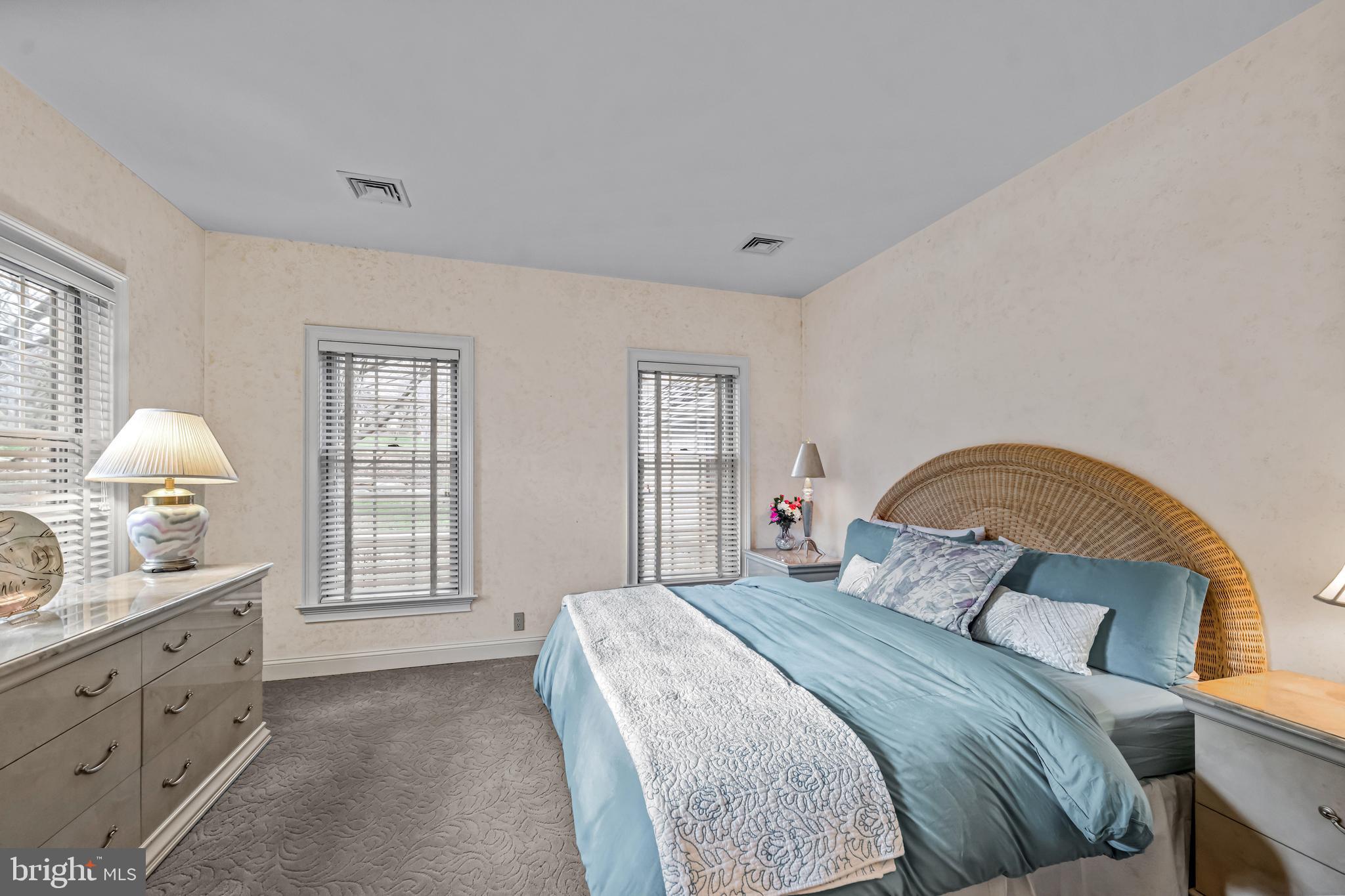 7 Mercer Gate Drive Doylestown, PA 18901 - Photo 17 of 44 a bedroom with a bed and a window