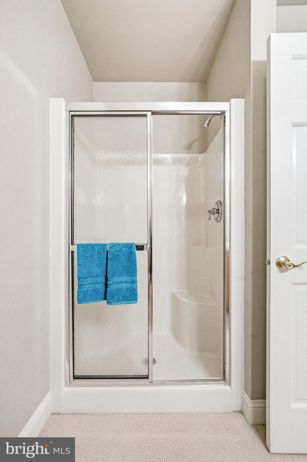 7 Mercer Gate Drive Doylestown, PA 18901 - Photo 35 of 44 a bathroom with a glass shower door