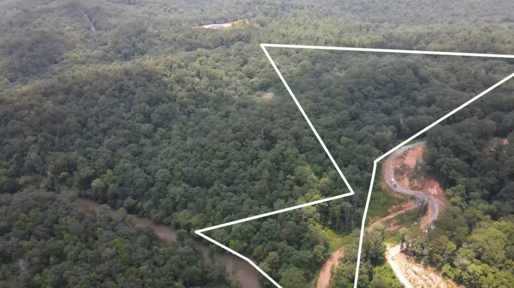 0 Kelly Bridge Road Dawsonville, GA 30534 - Photo 2 of 5 a view of wooden floor in an outdoor space