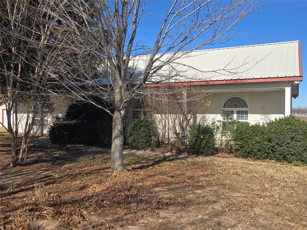 700 County Road 408 Comanche, TX 76442 - Photo 1 of 22 a view of a house with a yard