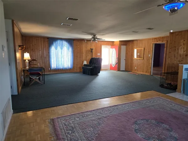 a view of a livingroom with furniture