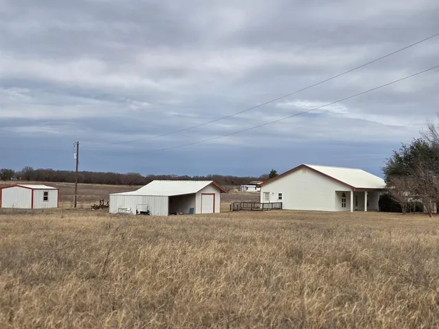 a house view with a outdoor space