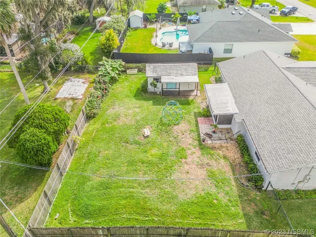 a swimming pool with yard