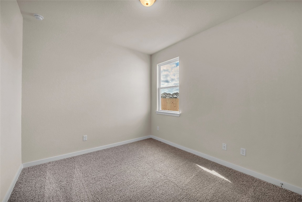 290 Boatright Boulevard Jarrell, TX 76537 - Photo 19 of 32 an empty room with a window