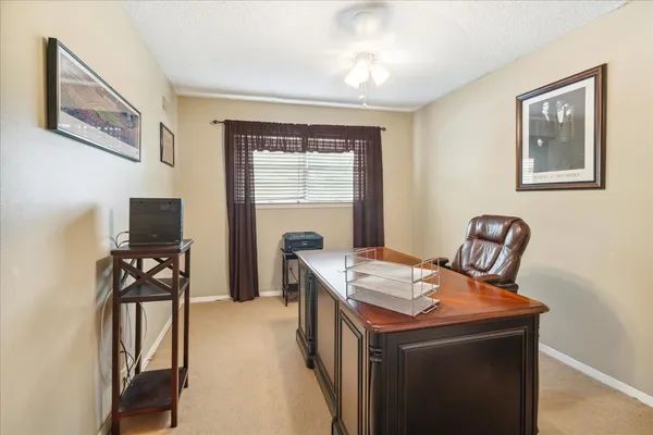 a kitchen that has a stove and a table