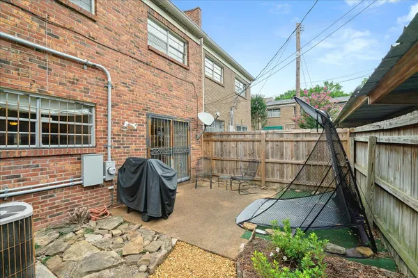 a backyard of a house with seating space