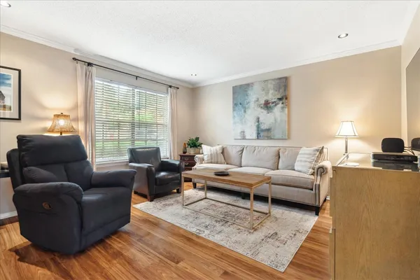 a living room with furniture and a couch